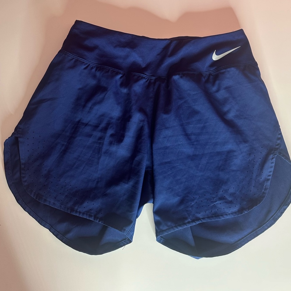 Women’s navy blue 4” Nike running shorts NWOT in size small